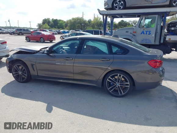 2018 BMW 4 Series 440i with VIN WBA4J5C54JBF07315, listed as a IAAI auction lot 41738540 with 74,577 mi miles and . Bid and sale history available at DreamBid. Image 14.
