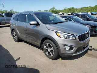 2017 Kia Sorento EX z VIN 5XYPHDA56HG232245, wystawiony jako Copart lot #56305625 z przebiegiem 76 947 mil mil oraz Szkoda całkowita • Salvage title. Historia ofert i sprzedaży dostępna na DreamBid. Obrazek 4.