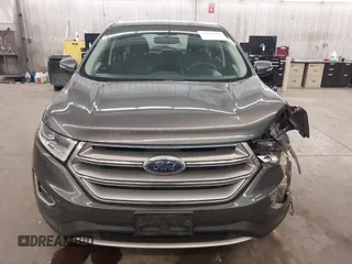 2015 Ford Edge SEL with VIN 2FMTK4J89FBB69648, listed as a IAAI auction lot 41765397 with 160,508 mi miles. Bid and sale history available at carsss.com. Image 13.