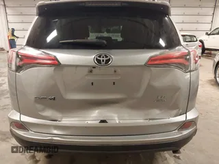 2016 Toyota RAV4 LE with VIN 2T3BFREV8GW509257, listed as a IAAI auction lot 41807349 with 216,031 mi miles. Bid and sale history available at carsss.com. Image 6.