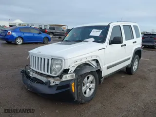 2011 Jeep Liberty Sport with VIN 1J4PP2GK5BW551564, listed as a IAAI auction lot 41126868 with 127,074 mi miles. Bid and sale history available at carsss.com. Image 2.