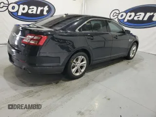 2019 Ford Taurus SEL with VIN 1FAHP2E83KG112946, listed as a Copart auction lot 45387775 with 128,904 mi miles and Clean Title. Bid and sale history available at DreamBid. Image 3.