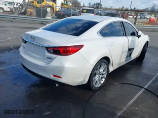 2017 Mazda Mazda6 Touring with VIN JM1GL1V59H1128856, listed as a IAAI auction lot 41803837 with 164,378 mi miles. Bid and sale history available at carsss.com. Image 4.