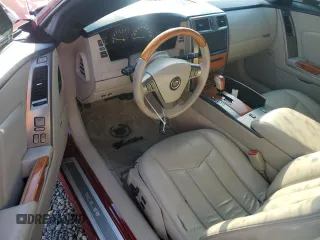 2006 Cadillac XLR z VIN 1G6YV36A465601366, wystawiony jako Copart lot #76229944 z przebiegiem 33 159 mil mil oraz Nie do naprawy. Historia ofert i sprzedaży dostępna na DreamBid. Obrazek 8.