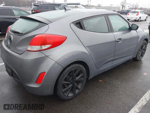 2017 Hyundai Veloster with VIN KMHTC6AD4HU309625, listed as a IAAI auction lot 41933497 with 184,632 mi miles. Bid and sale history available at carsss.com. Image 4.