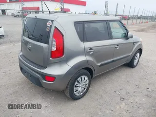 2013 Kia Soul with VIN KNDJT2A53D7636040, listed as a IAAI auction lot 40979461 with 122,530 mi miles. Bid and sale history available at carsss.com. Image 4.