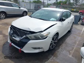 2016 Nissan Maxima S with VIN 1N4AA6AP3GC417157, listed as a IAAI auction lot 41919516 with 141,775 mi miles and . Bid and sale history available at carsss.com. Image 2.