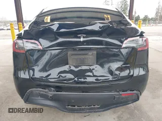 2023 Tesla Model Y Long Range with VIN 7SAYGDEE4PF789102, listed as a IAAI auction lot 41788860 with 88,457 mi miles and . Bid and sale history available at DreamBid. Image 6.