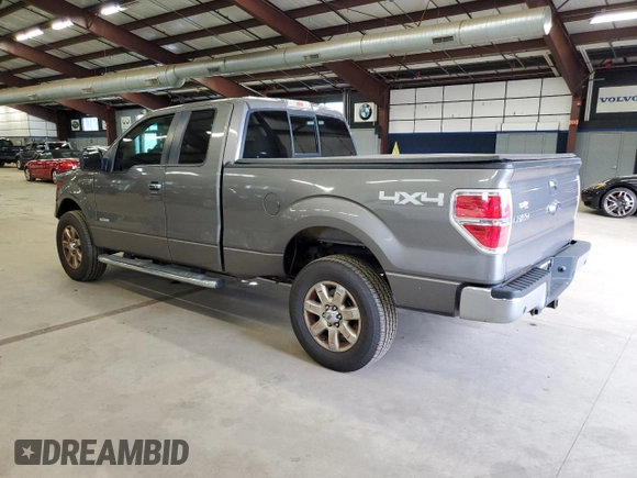 2014 Ford F-150 XL with VIN 1FTFX1ET3EKE32124, listed as a Copart auction lot 63598485 with 143,626 mi miles and Salvage title. Bid and sale history available at DreamBid. Image 2.