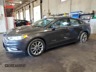 2017 Ford Fusion Hybrid SE with VIN 3FA6P0LU5HR155228, listed as a Copart auction lot 65090365 with 67,453 mi miles and Salvage title. Bid and sale history available at DreamBid. Image 1.
