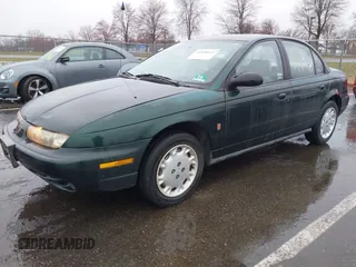 1996 Saturn SL with VIN 1G8ZK5277TZ293544, listed as a IAAI auction lot 41858643 with 189,450 mi miles and . Bid and sale history available at DreamBid. Image 2.