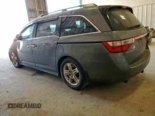 2012 Honda Odyssey Touring с VIN 5FNRL5H94CB049626, выставлен на аукционе Copart как лот 61191435 с пробегом 199 728 миль миль и Списание • Salvage title. История ставок и продаж доступна на DreamBid. Изображение 2.