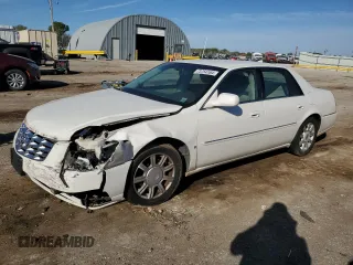 2009 Cadillac DTS 1SC z VIN 1G6KD57Y79U139542, wystawiony jako Copart lot #73754164 z przebiegiem Nie podano mil oraz Szkoda całkowita • Salvage title. Historia ofert i sprzedaży dostępna na DreamBid. Obrazek 1.