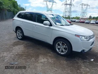 2014 Mitsubishi Outlander SE z VIN JA4AZ3A30EZ003367, wystawiony jako IAAI lot #42354226 z przebiegiem 143 406 mil mil oraz . Historia ofert i sprzedaży dostępna na DreamBid. Obrazek 1.