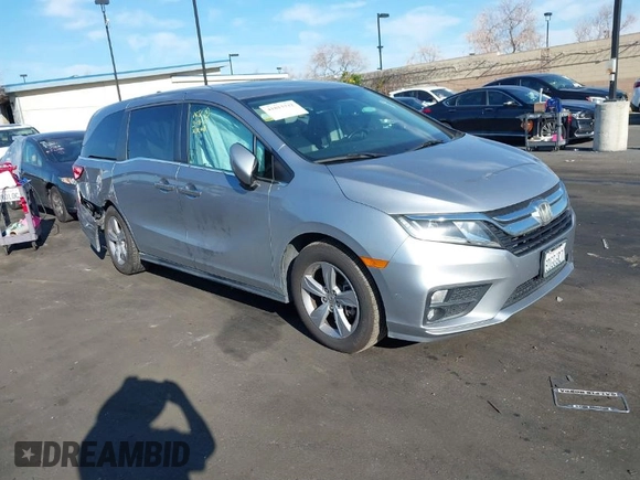 2018 Honda Odyssey EX-L with VIN 5FNRL6H71JB089289, listed as a IAAI auction lot 41813322 with 94,933 mi miles and . Bid and sale history available at DreamBid. Image 1.