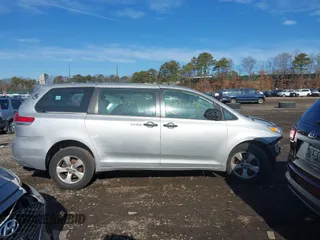 2014 Toyota Sienna L with VIN 5TDZK3DC8ES476153, listed as a IAAI auction lot 41462668 with 999,999 mi miles. Bid and sale history available at carsss.com. Image 12.