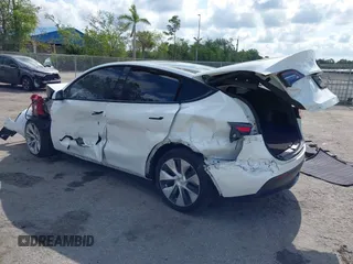 2021 Tesla Model Y Long Range z VIN 5YJYGDEE2MF200315, wystawiony jako IAAI lot #42233599 z przebiegiem 38 742 mil mil oraz . Historia ofert i sprzedaży dostępna na DreamBid. Obrazek 3.