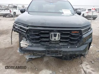 2023 Honda Pilot TrailSport with VIN 5FNYG1H63PB051646, listed as a IAAI auction lot 41069614 with 28,730 mi miles. Bid and sale history available at carsss.com. Image 6.