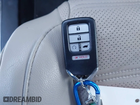 2018 Honda CR-V Touring with VIN 5J6RW1H95JL006062, listed as a IAAI auction lot 41072002 with 50,930 mi miles and . Bid and sale history available at DreamBid. Image 11.