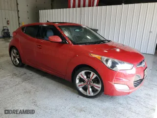 2013 Hyundai Veloster w/Gray Int with VIN KMHTC6AD7DU114144, listed as a Copart auction lot 51412845 with 128,305 mi miles and Clean Title. Bid and sale history available at carsss.com. Image 4.