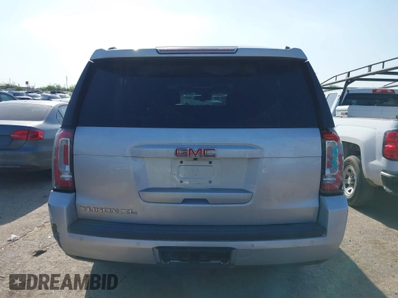 2016 GMC Yukon XL SLT z VIN 1GKS1GKC3GR268945, wystawiony jako IAAI lot #41864816 z przebiegiem 171 815 mil mil oraz . Historia ofert i sprzedaży dostępna na DreamBid. Obrazek 16.