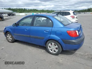 2009 Kia Rio LX with VIN KNADE223696530633, listed as a Copart auction lot 68371794 with 165,505 mi miles and Salvage Title. Bid and sale history available at carsss.com. Image 2.