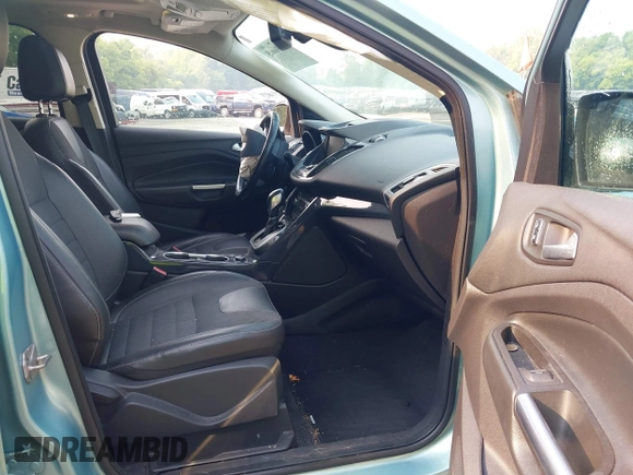 2013 Ford Escape Titanium with VIN 1FMCU9J99DUD63037, listed as a IAAI auction lot 42436605 with 168,200 mi miles and . Bid and sale history available at DreamBid. Image 5.
