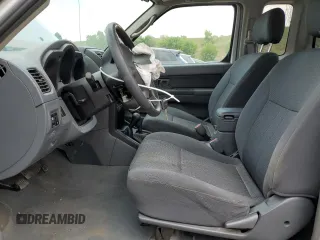 2004 Nissan Frontier XE Desert Runner with VIN 1N6ED26Y44C402138, listed as a Copart auction lot 58828425 with 125,143 mi miles and Salvage title. Bid and sale history available at DreamBid. Image 7.
