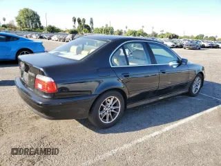 2003 BMW 5 Series 525i with VIN WBADT33433GF43797, listed as a Copart auction lot 70476904 with 194,319 mi miles and Salvage Title. Bid and sale history available at carsss.com. Image 3.