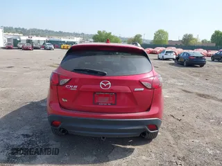 2016 Mazda CX-5 Grand Touring with VIN JM3KE4DY9G0850583, listed as a IAAI auction lot 42075545 with 92,789 mi miles and . Bid and sale history available at carsss.com. Image 16.