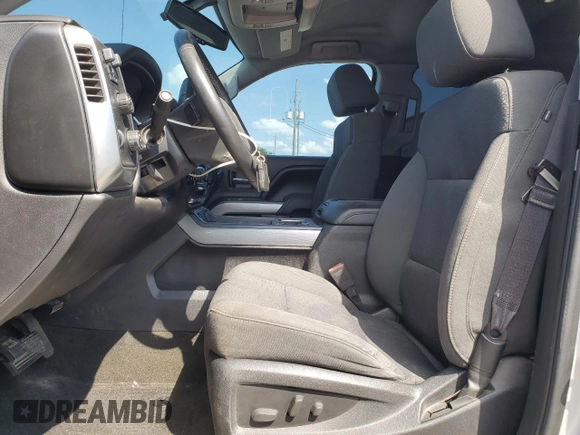 2015 Chevrolet Silverado 1500 LT with VIN 3GCUKREC9FG433906, listed as a Copart auction lot 52495785 with 99,268 mi miles and Salvage Title. Bid and sale history available at DreamBid. Image 7.