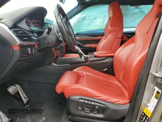 2016 BMW X5 M z VIN 5YMKT6C51G0R77692, wystawiony jako Copart lot #81979013 z przebiegiem 56 774 mil mil oraz . Historia ofert i sprzedaży dostępna na DreamBid. Obrazek 7.