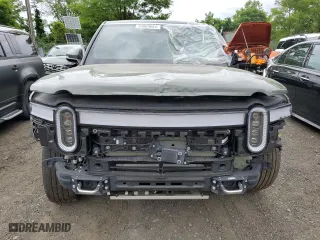 2022 Rivian R1S Launch Edition with VIN 7PDSGABL7NN001893, listed as a Copart auction lot 58809684 with 19,067 mi miles and Salvage Title. Bid and sale history available at carsss.com. Image 5.