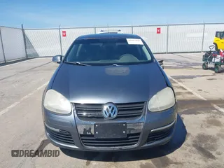 2009 Volkswagen Jetta S with VIN 3VWJZ71K49M075892, listed as a IAAI auction lot 42097445 with 218,016 mi miles and . Bid and sale history available at DreamBid. Image 12.