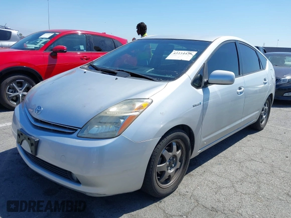 2007 Toyota Prius with VIN JTDKB20U877677686, listed as a IAAI auction lot 42234436 with 240,763 mi miles and . Bid and sale history available at DreamBid. Image 2.