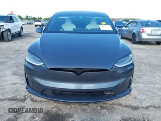 2022 Tesla Model X with VIN 7SAXCDE54NF342256, listed as a IAAI auction lot 41991212 with 28,740 mi miles and . Bid and sale history available at DreamBid. Image 6.