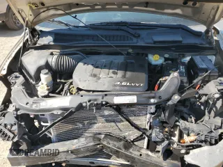 2013 Dodge Grand Caravan SXT with VIN 2C4RDGCG0DR639634, listed as a Copart auction lot 52548075 with 27,799 mi miles and Salvage Title. Bid and sale history available at DreamBid. Image 14.