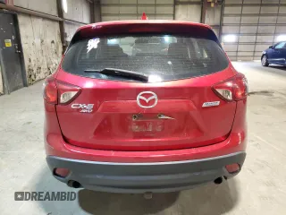 2016 Mazda CX-5 Sport z VIN JM3KE4BY9G0824021, wystawiony jako Copart lot #52392345 z przebiegiem 121 990 mil mil oraz Szkoda całkowita • Salvage title. Historia ofert i sprzedaży dostępna na DreamBid. Obrazek 6.