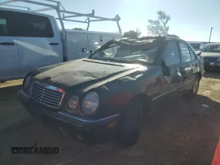 1996 Mercedes-Benz E-Class with VIN WDBJF55FXTJ011680, listed as a Copart auction lot 88752555 with 0 mi miles and Salvage Title. Bid and sale history available at carsss.com. Image 1.