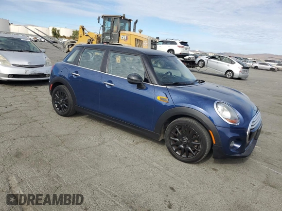 2015 MINI Hardtop 4 Door z VIN WMWXS5C5XFT831166, wystawiony jako Copart lot #78248204 z przebiegiem 69 459 mil mil oraz Szkoda całkowita • Salvage title. Historia ofert i sprzedaży dostępna na DreamBid. Obrazek 4.