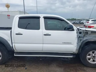 2007 Toyota Tacoma PreRunner with VIN 3TMJU62N77M030897, listed as a IAAI auction lot 42319094 with 325,560 mi miles and . Bid and sale history available at DreamBid. Image 14.