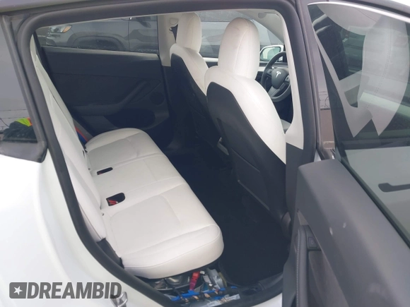 2023 Tesla Model Y Performance with VIN 7SAYGDEFXPF589477, listed as a IAAI auction lot 41936981 with 28,993 mi miles and . Bid and sale history available at DreamBid. Image 8.