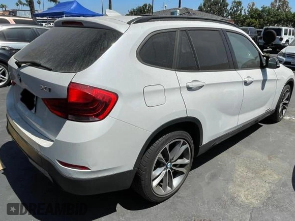2013 BMW X1 28i with VIN WBAVM1C54DVW43125, listed as a Copart auction lot 51154175 with 123,737 mi miles and Clean Title. Bid and sale history available at carsss.com. Image 4.