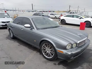 2006 Jaguar XJ Vanden Plas z VIN SAJWA82B76SH10941, wystawiony jako IAAI lot #42159262 z przebiegiem 134 886 mil mil oraz . Historia ofert i sprzedaży dostępna na DreamBid. Obrazek 1.