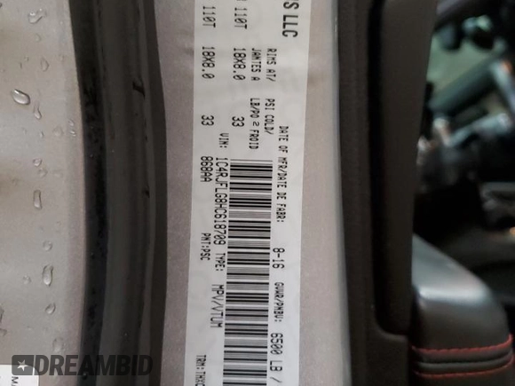 2017 Jeep Grand Cherokee Trailhawk with VIN 1C4RJFLG8HC618709, listed as a Copart auction lot 52899194 with 69,000 mi miles and Salvage title. Bid and sale history available at DreamBid. Image 13.