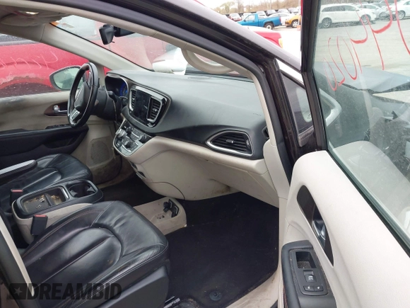 2017 Chrysler Pacifica Touring L with VIN 2C4RC1BG1HR797200, listed as a IAAI auction lot 42044020 with 124,115 mi miles and . Bid and sale history available at DreamBid. Image 5.