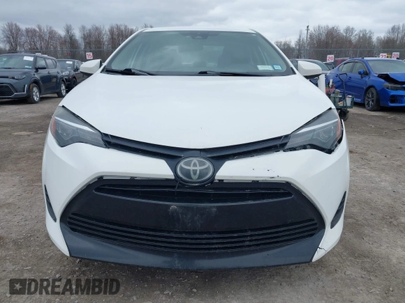 2019 Toyota Corolla L with VIN 5YFBURHE0KP889909, listed as a IAAI auction lot 41888953 with 130,529 mi miles. Bid and sale history available at carsss.com. Image 12.