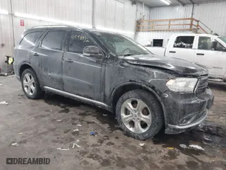 2014 Dodge Durango Limited with VIN 1C4RDJDG5EC977844, listed as a IAAI auction lot 41558932 with 133,703 mi miles. Bid and sale history available at carsss.com. Image 1.
