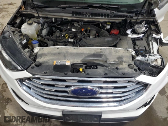 2020 Ford Edge SEL z VIN 2FMPK4J96LBA41535, wystawiony jako Copart lot #56077665 z przebiegiem 55 666 mil mil oraz Szkoda całkowita • Salvage title. Historia ofert i sprzedaży dostępna na DreamBid. Obrazek 12.