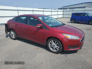 2016 Ford Focus SE with VIN 1FADP3F20GL367406, listed as a Copart auction lot 65266585 with 47,546 mi miles and Salvage title. Bid and sale history available at DreamBid. Image 4.